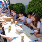 , Peste 200 de copii au pictat scoici la Zalău de 1 Iunie: Adela by Denta Clinic transformă arta în caritate, TransilvaniaTV.ro